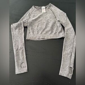 Gymshark long sleeve crop top size-small
Like new condition
